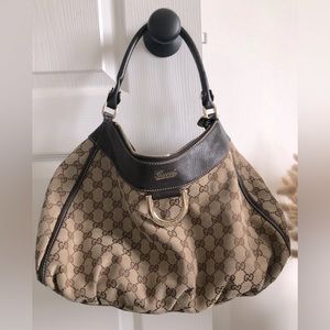 Gucci shoulder bag bought at Heathrow Airport in 2008.